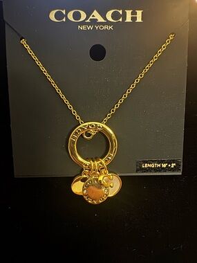 Coach Gold-Tone Circle Pendant Necklace with Charm Discs